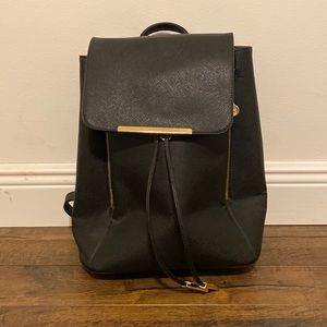 Black backpack with gold details